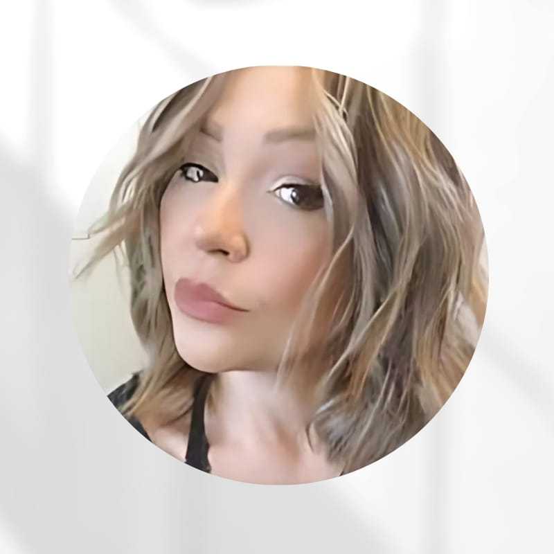 Portrait of Melissa Muro, a professional stylist at Zootcuts, showcasing their expertise and style.